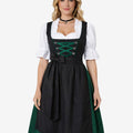 Front view of model wearing traditional German dirndl dress with black apron, green skirt, lace blouse and alpine lace-up bodice