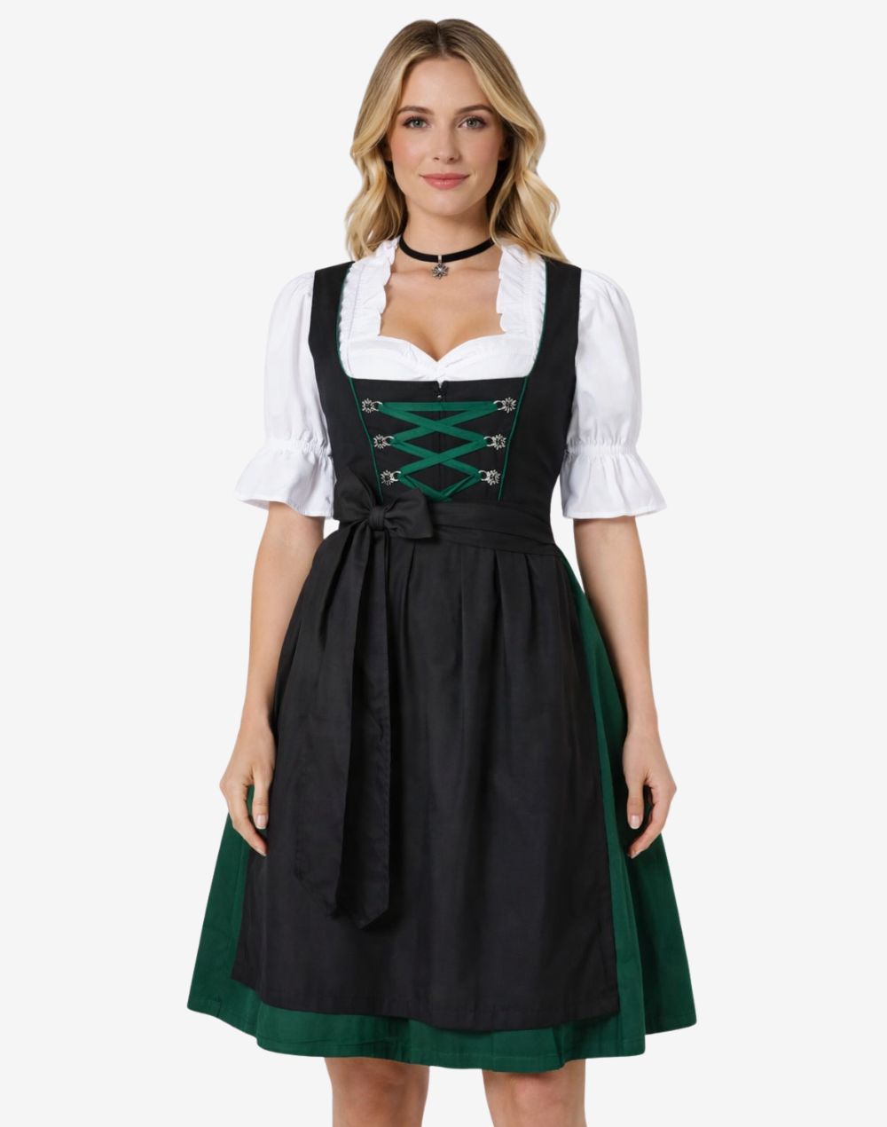 Front view of model wearing traditional German dirndl dress with black apron, green skirt, lace blouse and alpine lace-up bodice