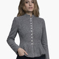 Woman wearing a gray blazer with a white background