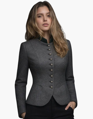 Woman wearing a gray blazer with buttons on a white background