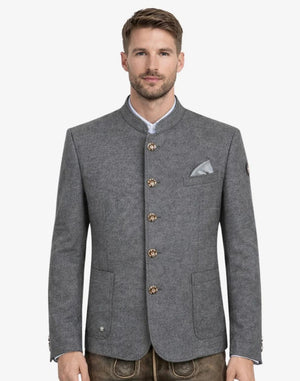 Man wearing a gray blazer with gold buttons on a white background