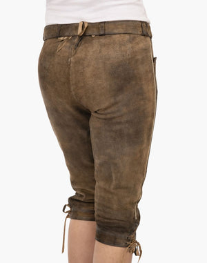 Brown leather pants with a white background