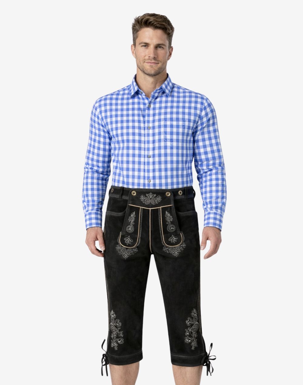 Front view of model wearing vintage German Bundhosen for men in black leather with Bavarian embroidery and traditional knee tie design