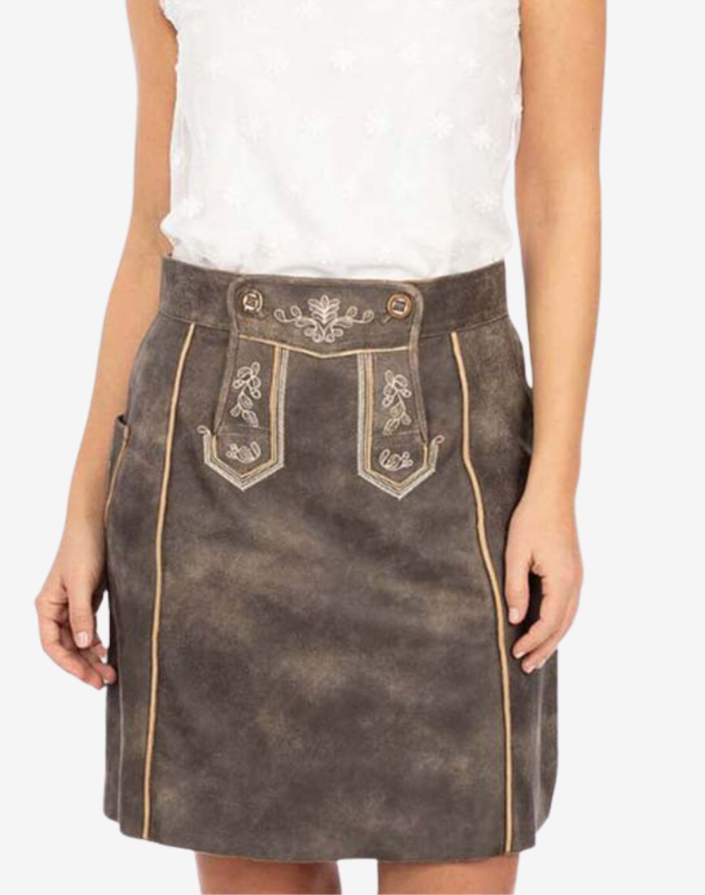 Women’s vintage-style brown leather trachten skirt with embroidered front panel, decorative stitching, and traditional Bavarian design, shown worn with a white blouse.