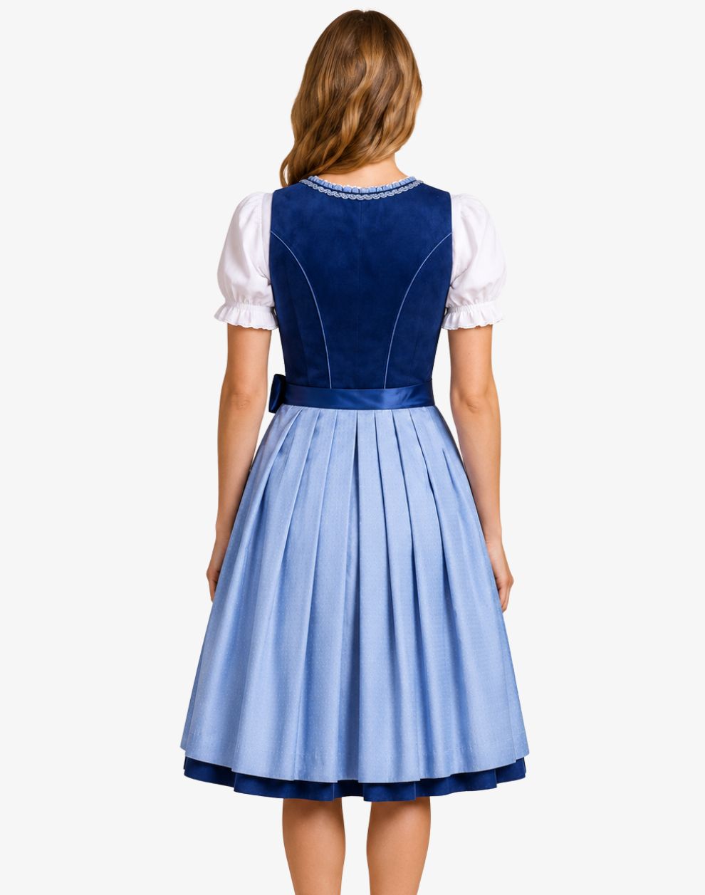 A woman shown from the back wearing a traditional German dirndl dress with a navy blue velvet bodice, white puffed sleeves, and a light blue pleated skirt, set against a plain light gray background.