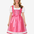 Front view of womens classic Bavarian dirndl featuring pink apron bow, fitted bodice and lace trimmed hem for Oktoberfest wear