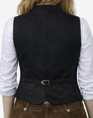 Black vest worn over a white shirt on a plain background
