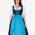 Front view of womens heritage style dirndl worn by model featuring blue apron, embroidered bodice and Bavarian design fit