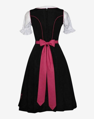 Back view of womens alpine dirndl showing fitted bodice, green waist tie and authentic traditional Bavarian silhouette