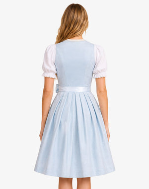 Back view of a model wearing the Women's Traditional Blue Dirndl Dress with a fitted light blue bodice, white puff-sleeve blouse, matching waist sash, and pleated Bavarian skirt.