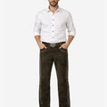 Man wearing a white shirt and brown pants on a white background