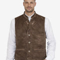 Model wearing mens leather Bavarian vest with lapel paired with traditional lederhosen outfit, showcasing authentic Trachten style for Oktoberfest and Alpine occasions.