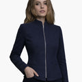 Woman wearing a navy blue jacket on a white background