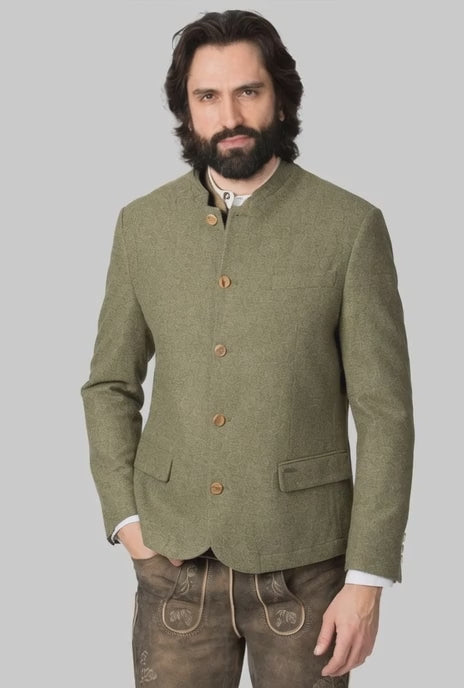 A man wearing green Wool Trachten jacket and showcasing thier jacket