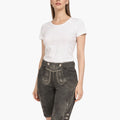 Woman wearing a white t-shirt and dark denim shorts on a white background